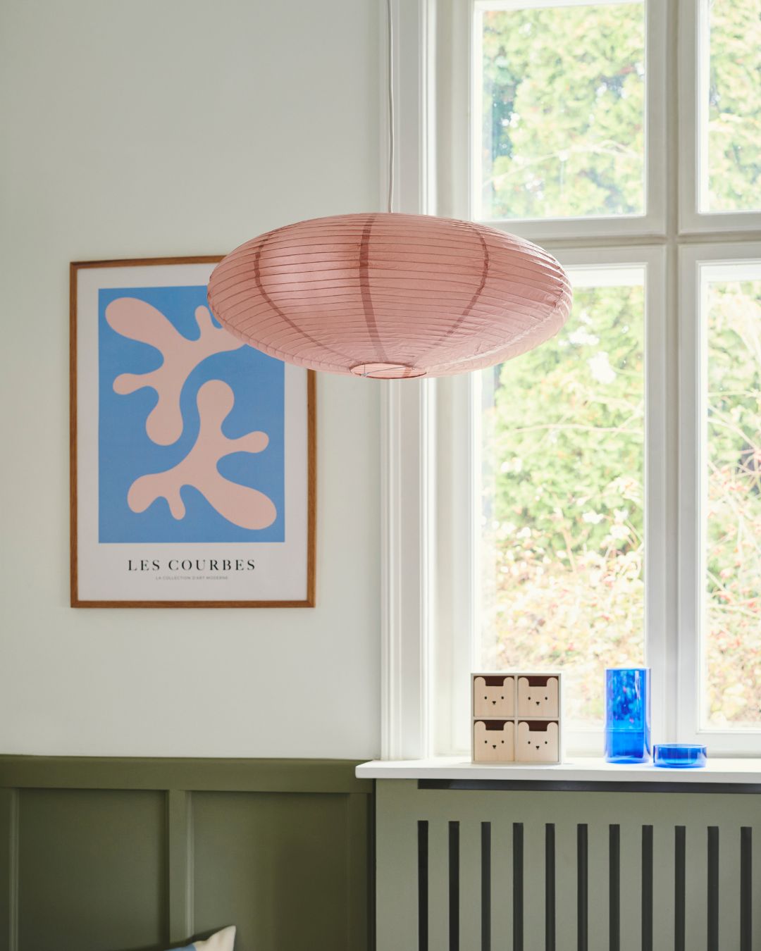 Paper hanging lamp in oval shape