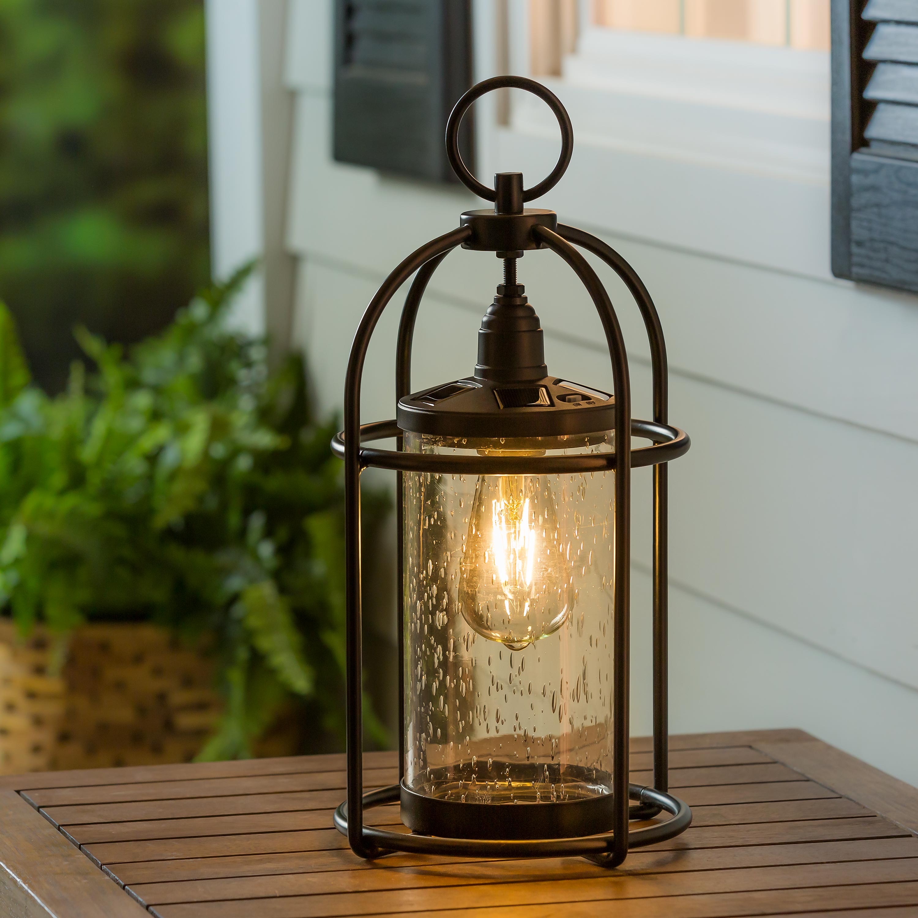 Solar lantern with bell glass and metal frame