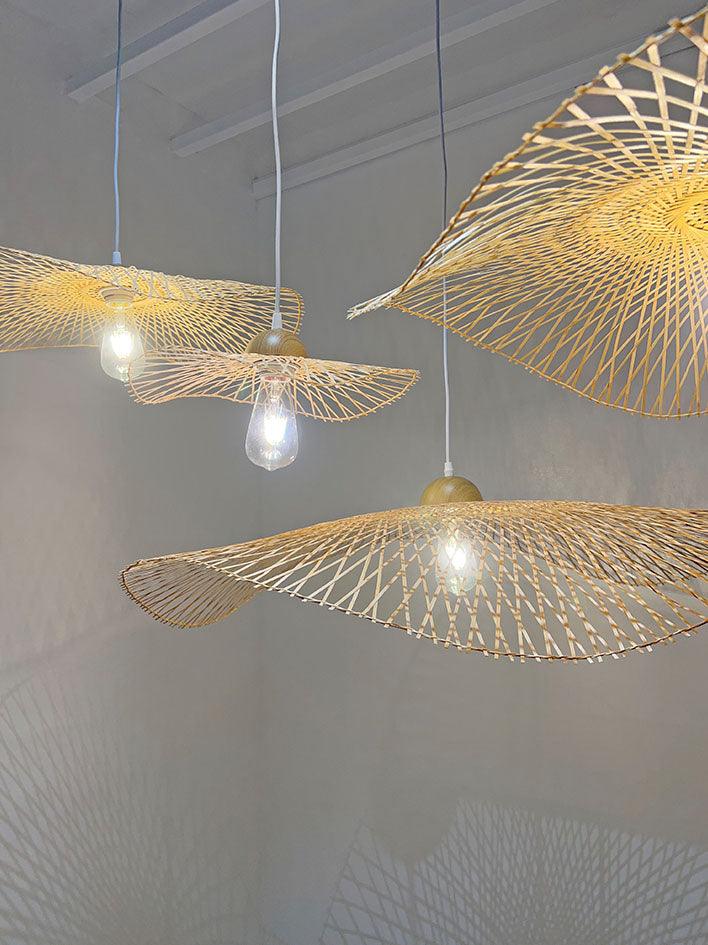 Organic rattan pendant lamps in wave shape