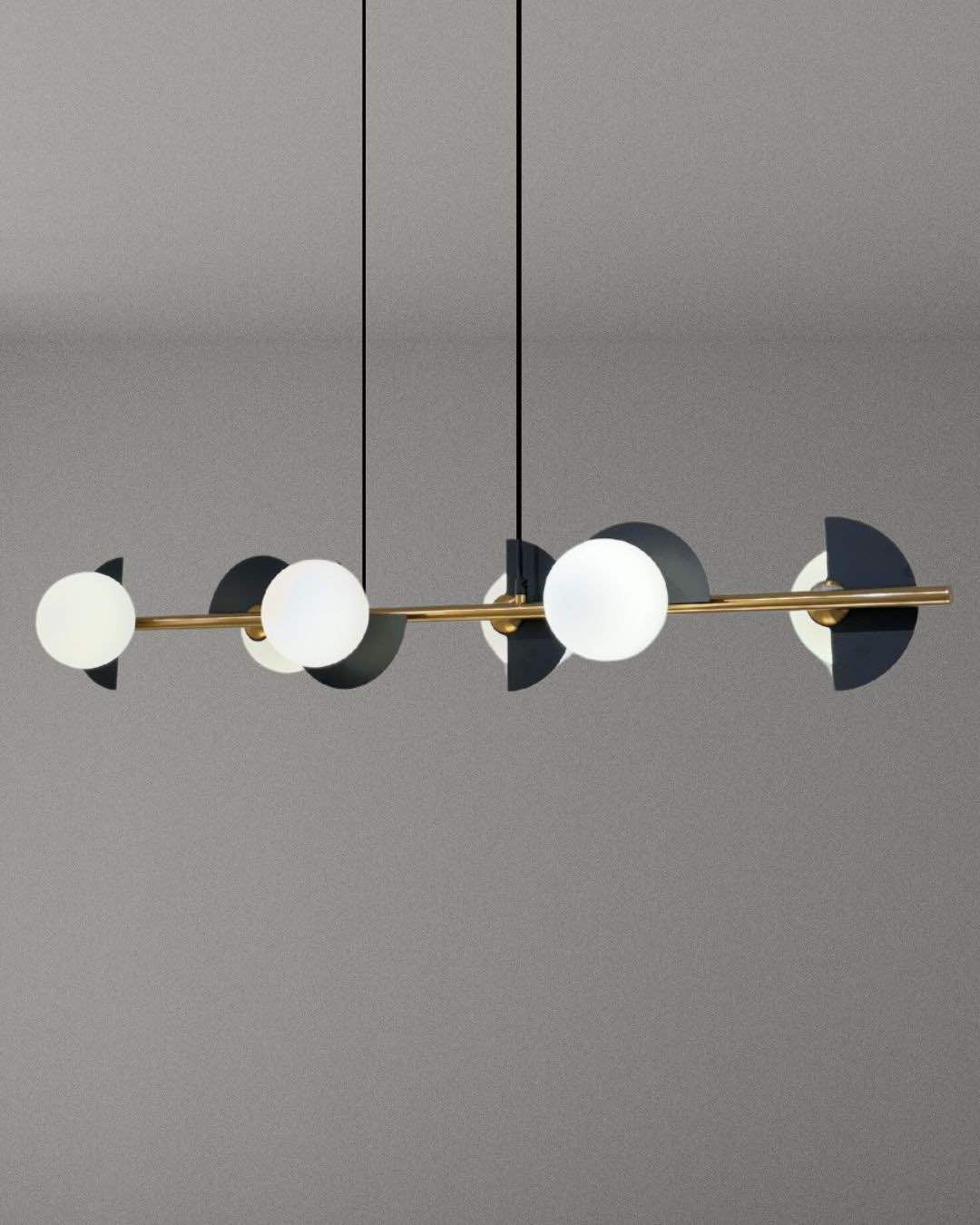 Caelum linear pendant lamp with graphic sphere accents