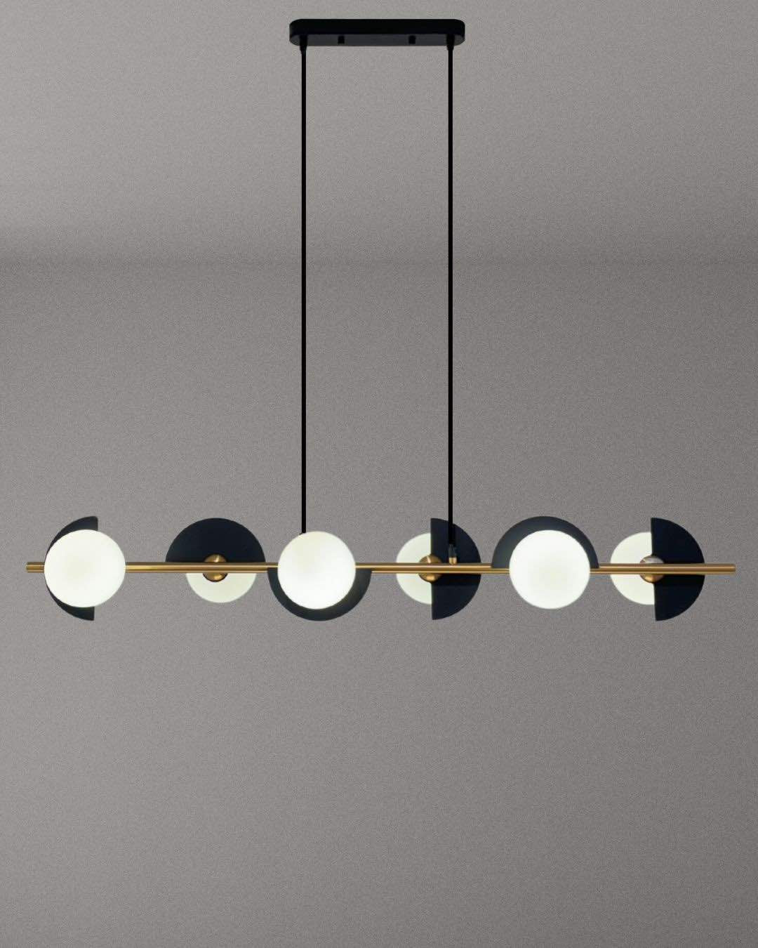 Caelum linear pendant lamp with graphic sphere accents