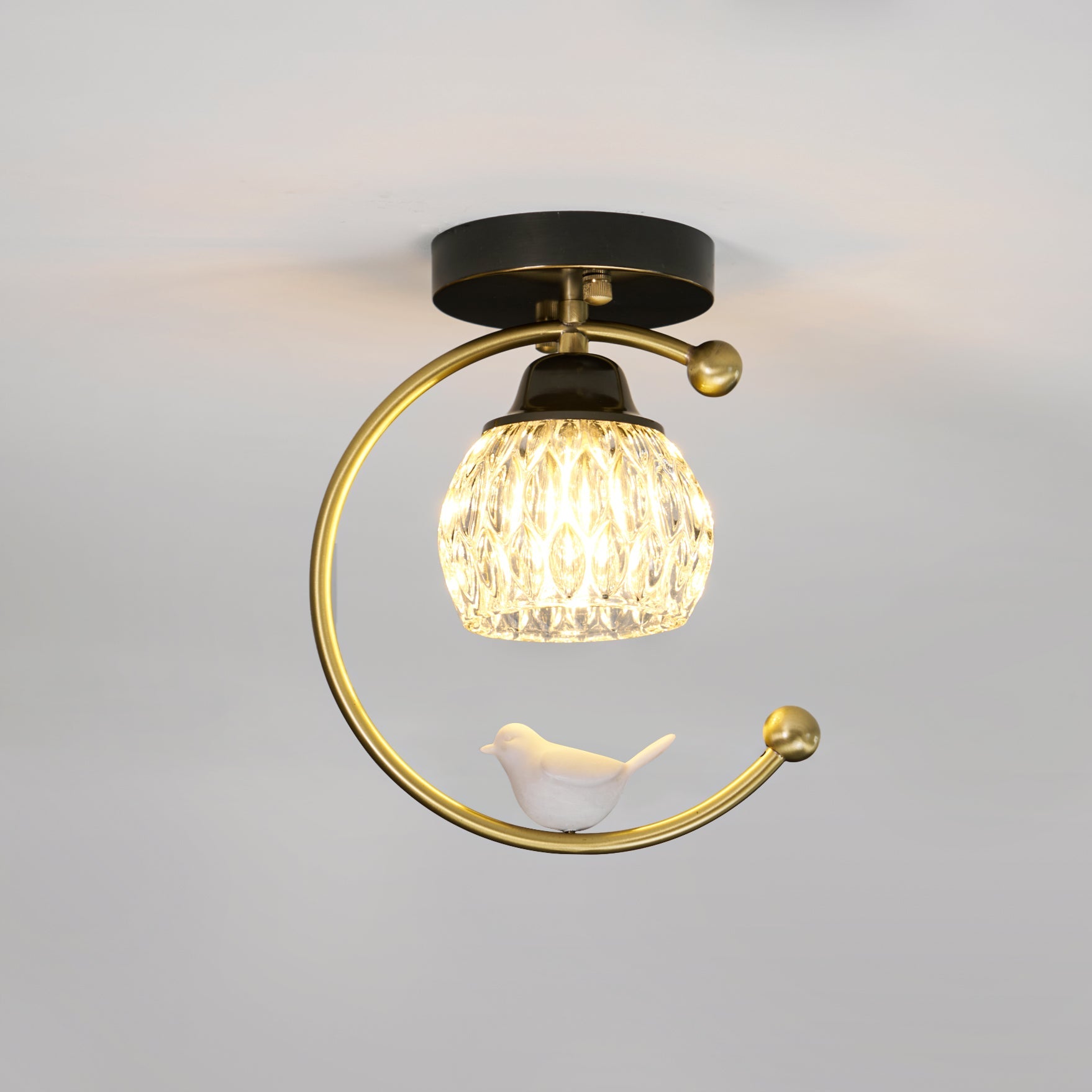 Modern Brass Ceiling Light with Glass Shade and Ceramic Bird Detail