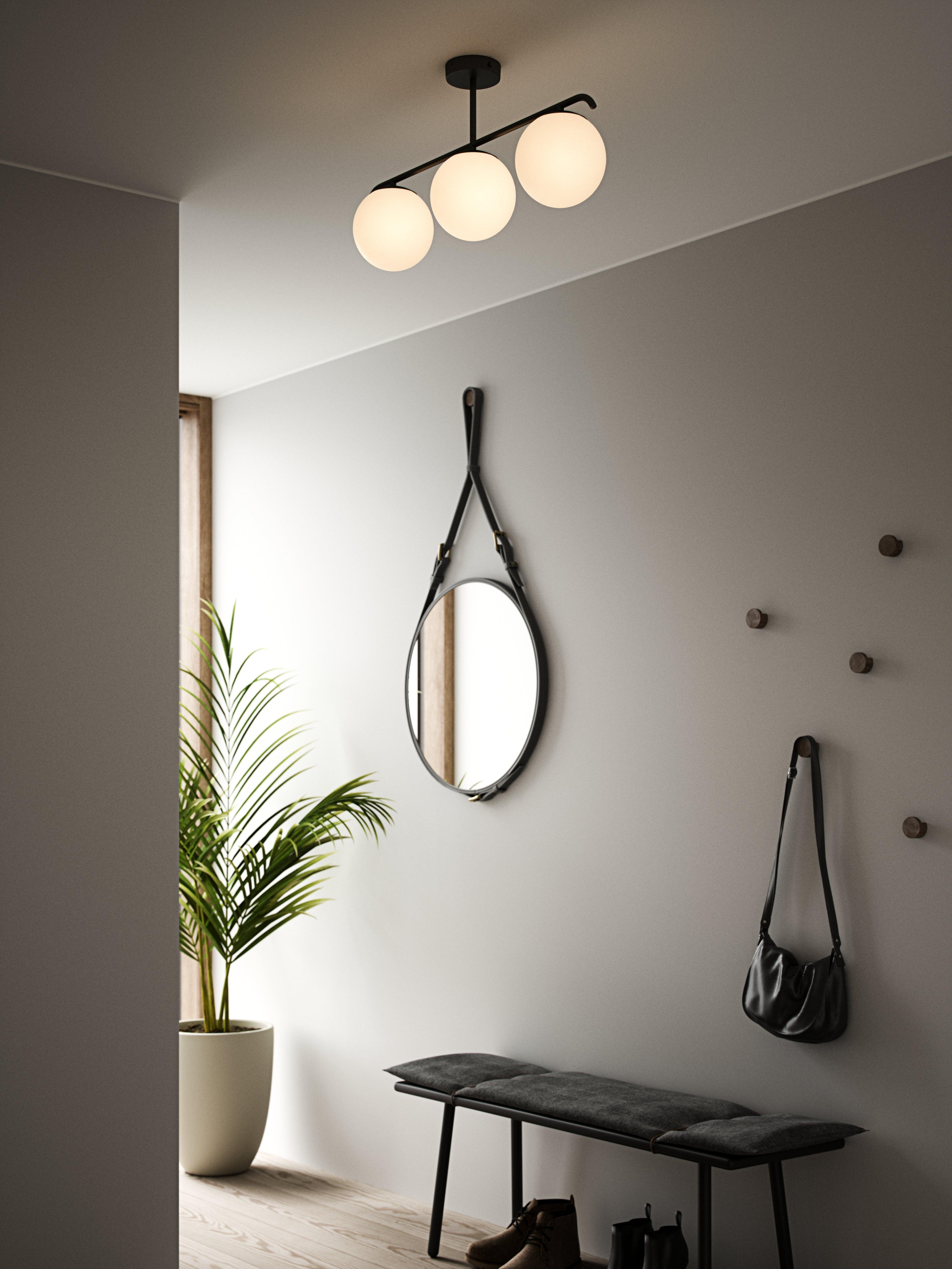 Ceiling lamp with three glass globes and golden frame