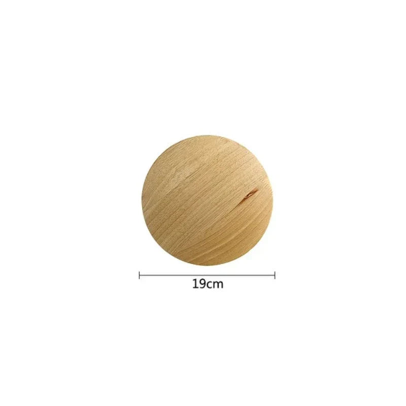 Radiant wall lamp made of wood