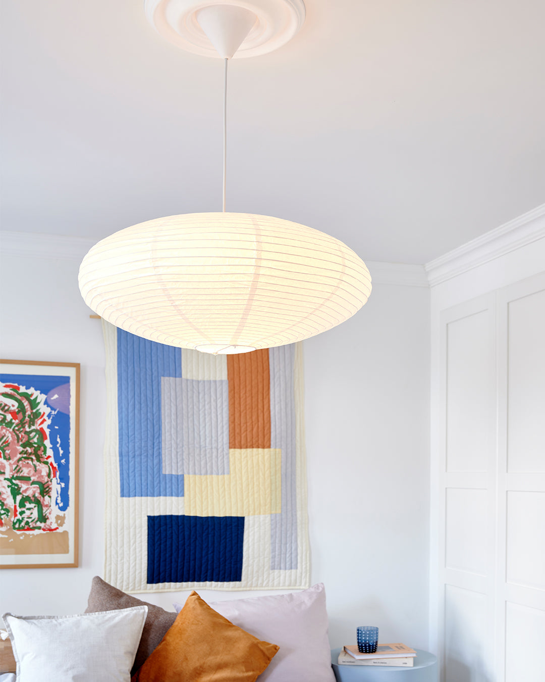 Paper hanging lamp in oval shape