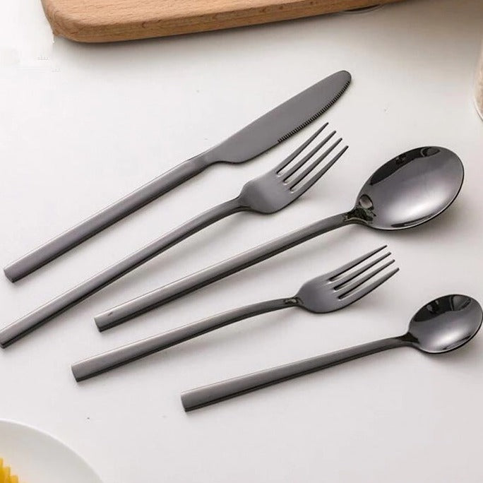 Gold-colored cutlery set in Scandinavian style