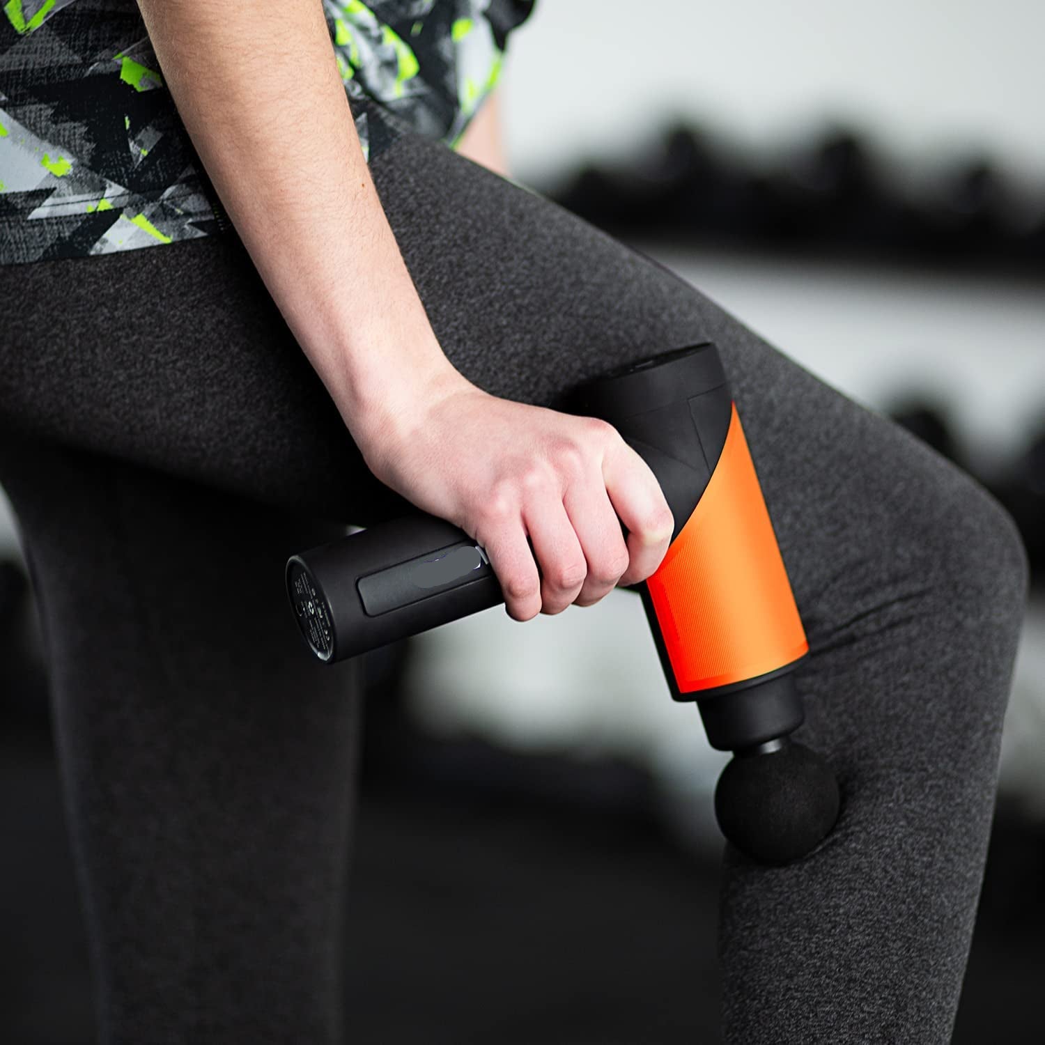 Portable massage device with impact therapy and interchangeable attachments