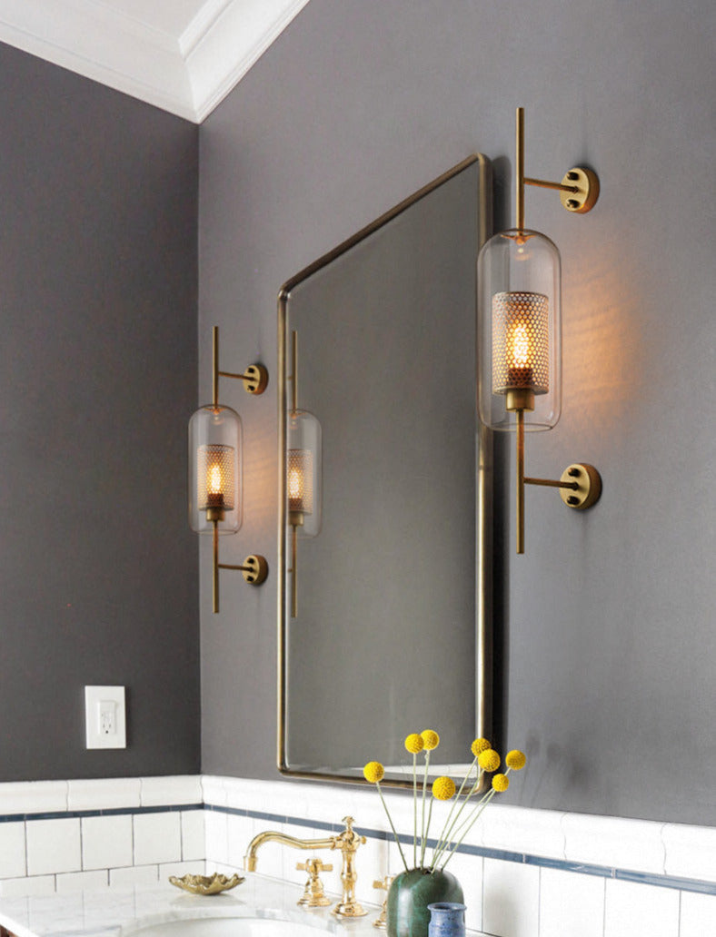 Wall lamp with glass globe and perforated light core