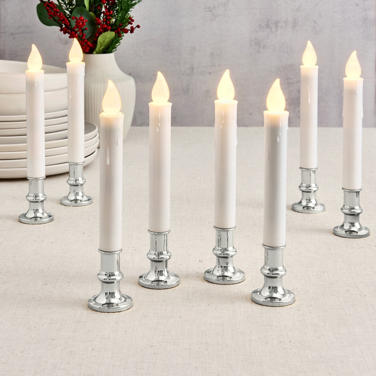 Set of eight LED candles with silver-colored base