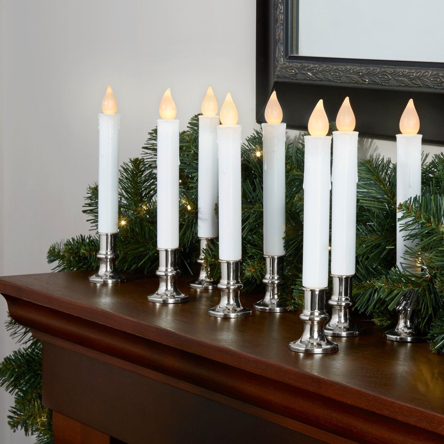 Set of eight LED candles with silver-colored base