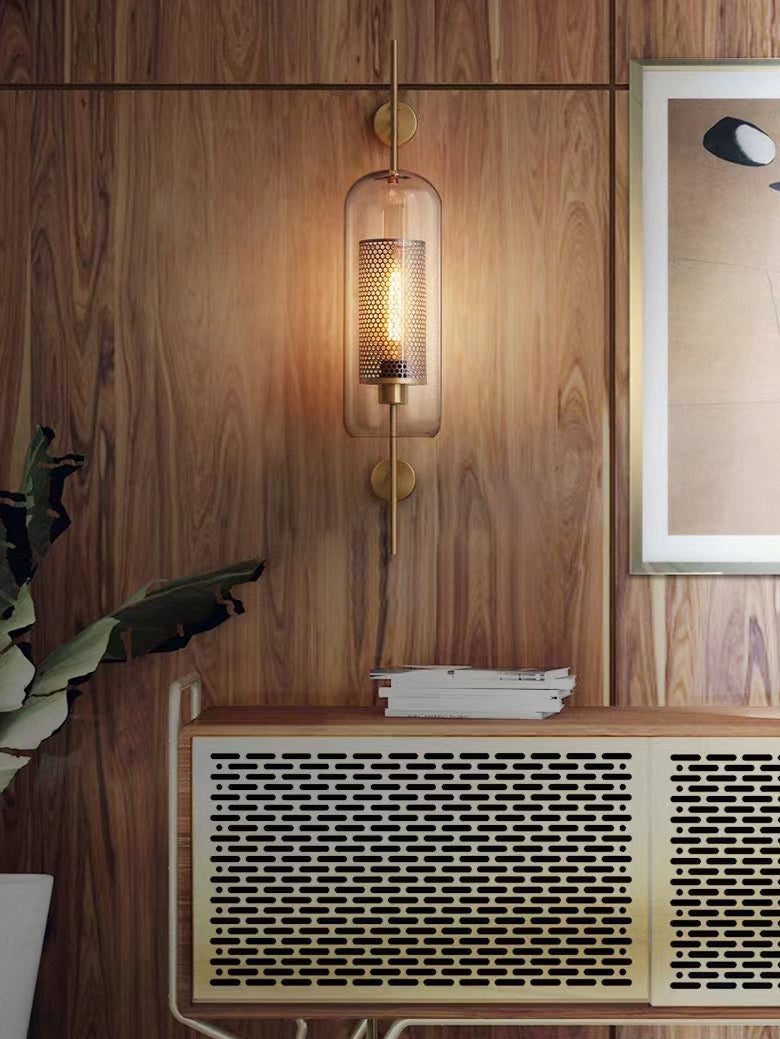 Wall lamp with glass globe and perforated light core
