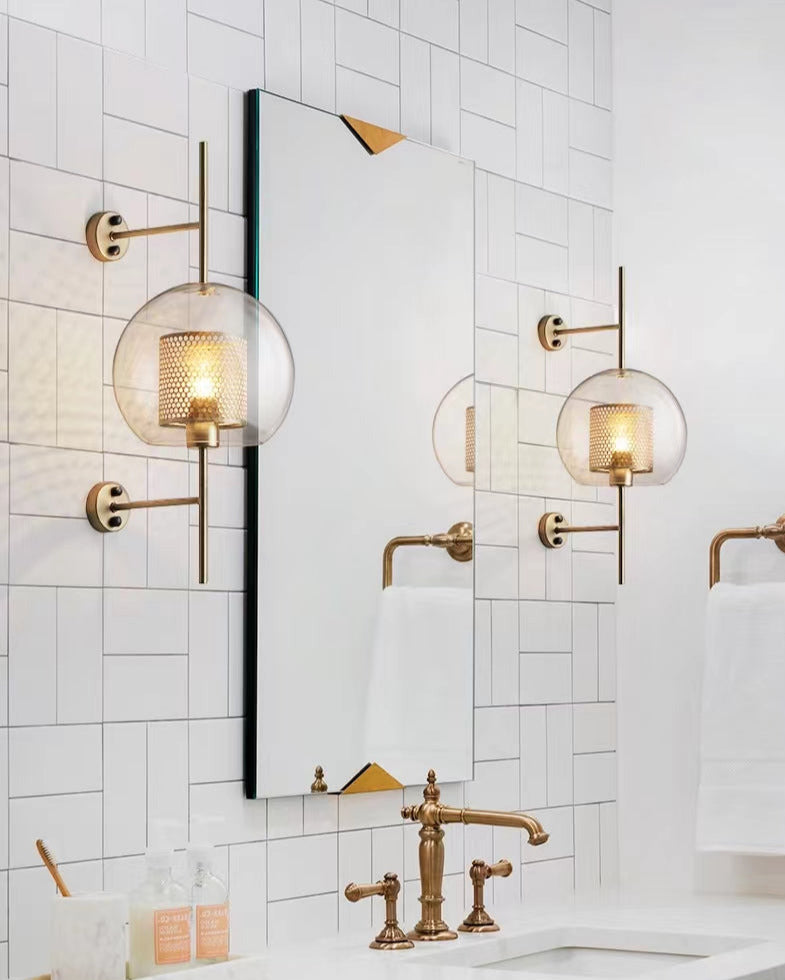 Wall lamp with glass globe and perforated light core