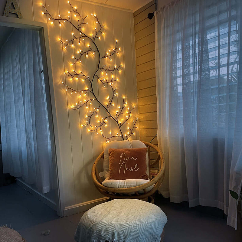 Glowing tree branch as wall decoration - Ambient lighting for indoor spaces